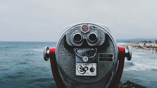 newport beach grey and black coin operated telescope closeup photography binocular